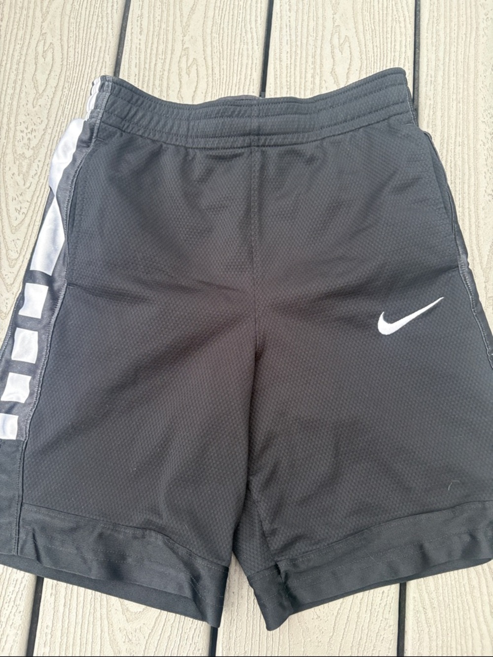 Nike Black Athletic Basketball Shorts with White Swoosh and Side Stripe